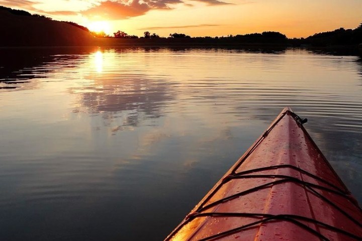 a sunset over a body of water